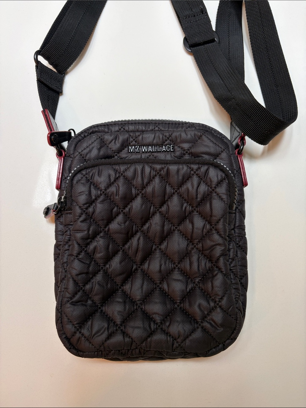 MZ Wallace Black Quilted Messenger Crossbody with Red Accent Hardware